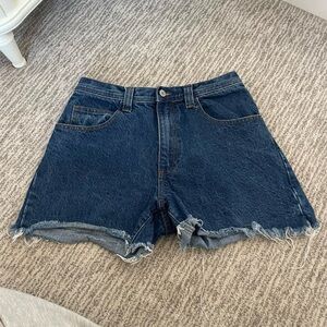 brandy melville medium wash denim shorts with frayed distressed seems
